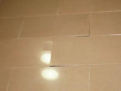 "Tile hollowing and detachment" - the tiles say they are not responsible for this!